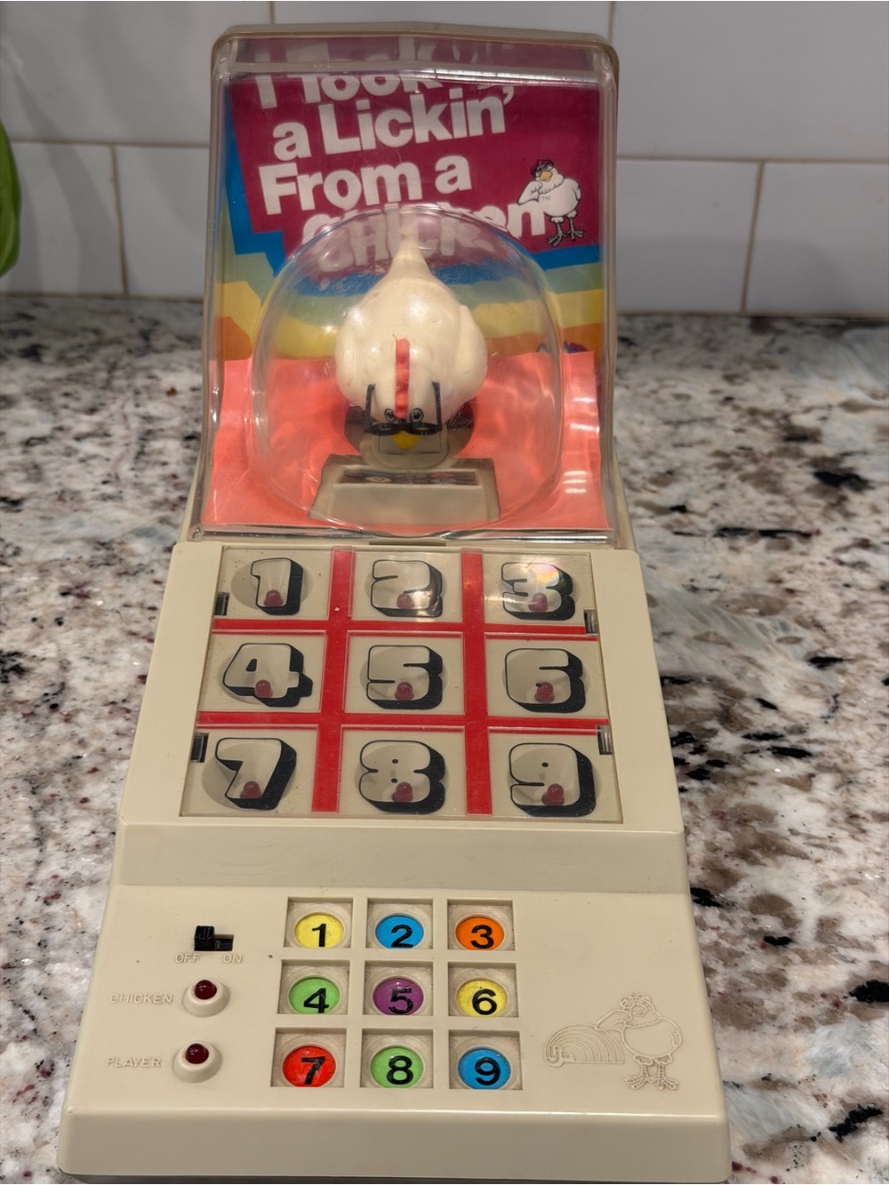 Vintage 'I Took a Lickin' From a Chicken' Electronic Kids Game - Cream